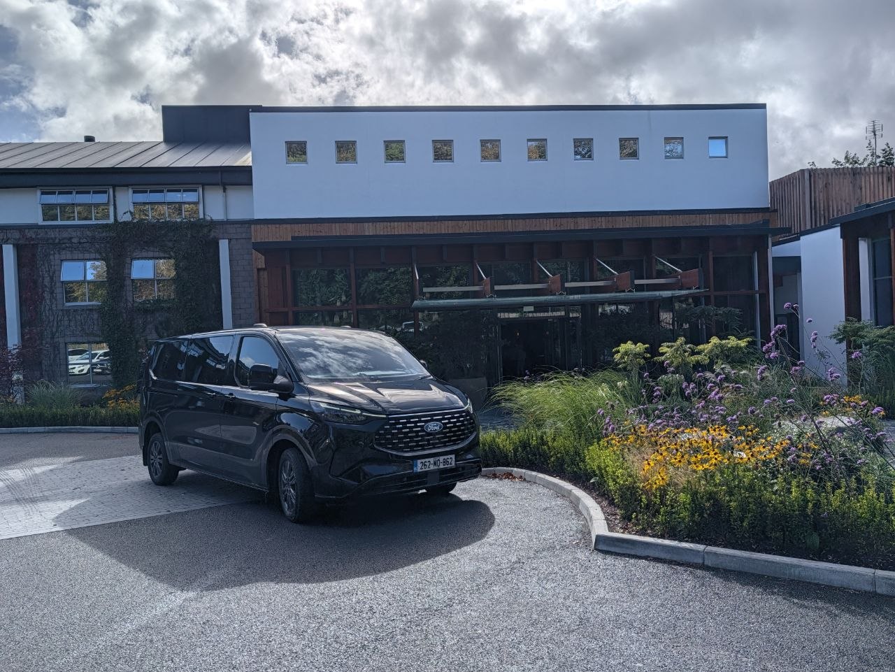 Eleven Chauffeurs Ford Tourneo waiting outside a hotel in Ireland